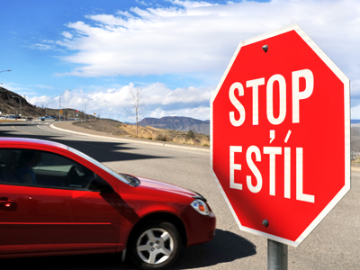 Stop signs at the TRU main campus in Kamloops now reflect the university being located in Secwepemc Territory.