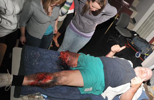Cornelis in't Veld gives the thumbs up during a mock disaster for the benefit of students in Health Sciences 383.