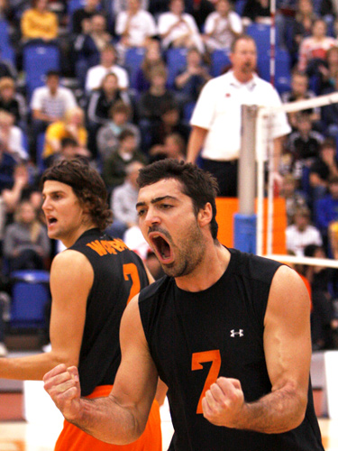 Behlul Yavasgel celebrates a point in a WolfPack Men's Volleyball game. Photos: A. Snucins