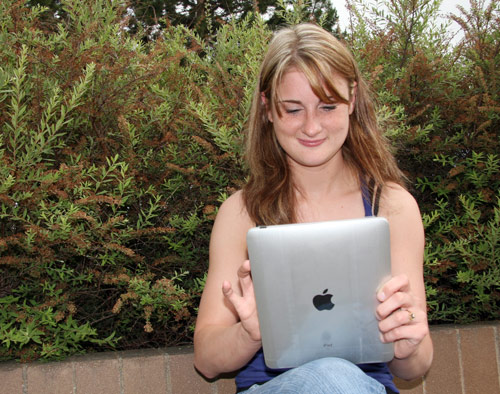 Erin, a 2009 Animal Health Technology Diploma graduate and her new iPad