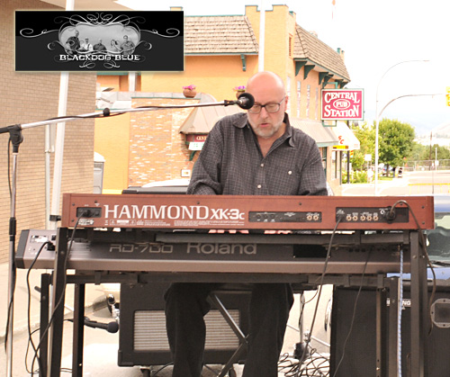 Blackdog Blue keyboardist and TRU Provost & Vice-president Uli Scheck performs during Hot Nite in the City car and vehicle show held along downtown Kamloops streets on Aug. 7, 2010.