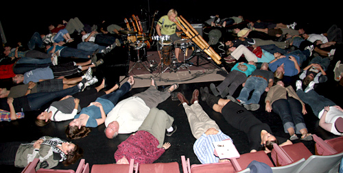 Shane Philip wrapped up his show by inviting audience members to lie on the stage and feel the vibration of the didgeridoo. 