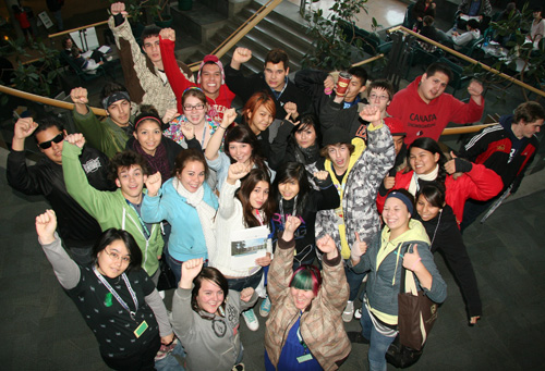 Some of the students attending the 5th Annual Transitions Day for Aboriginal Students in School District #73 on Nov. 18, 2010 put some enthusiasm into a group photo in the atrium area of the Campus Activity Centre for a group photo.