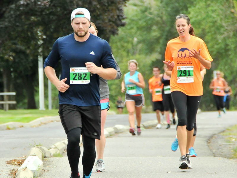 Racers in the 8km category make their way through McArthur Island Park during the 2015 Kamloops Marathon.