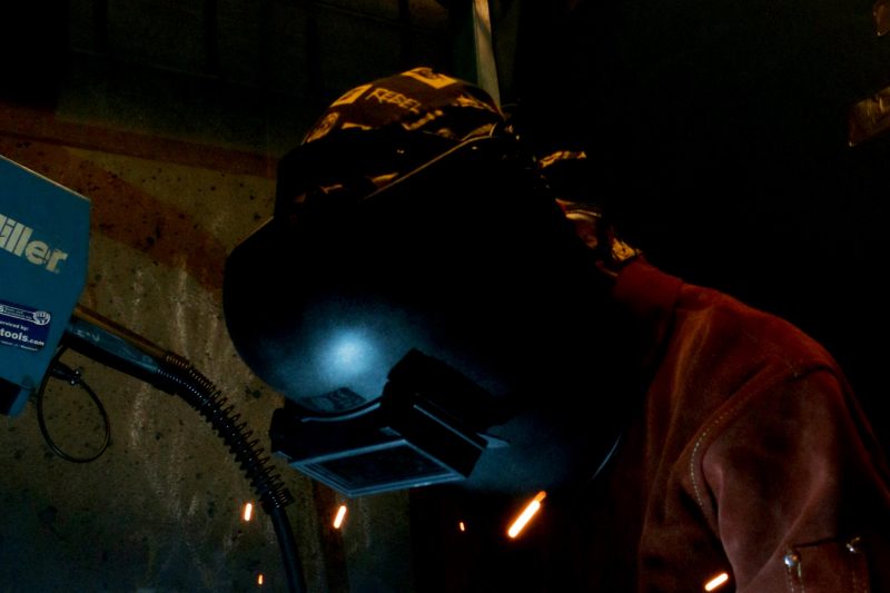 In a welding booth.