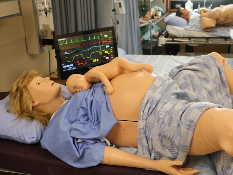 Victoria and baby Florence, the new high fidelity birthing mannequin in the School of Nursing.