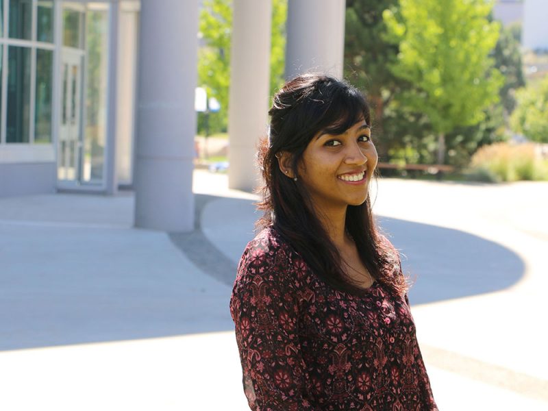 Tanya Thomas in front of the International Building.