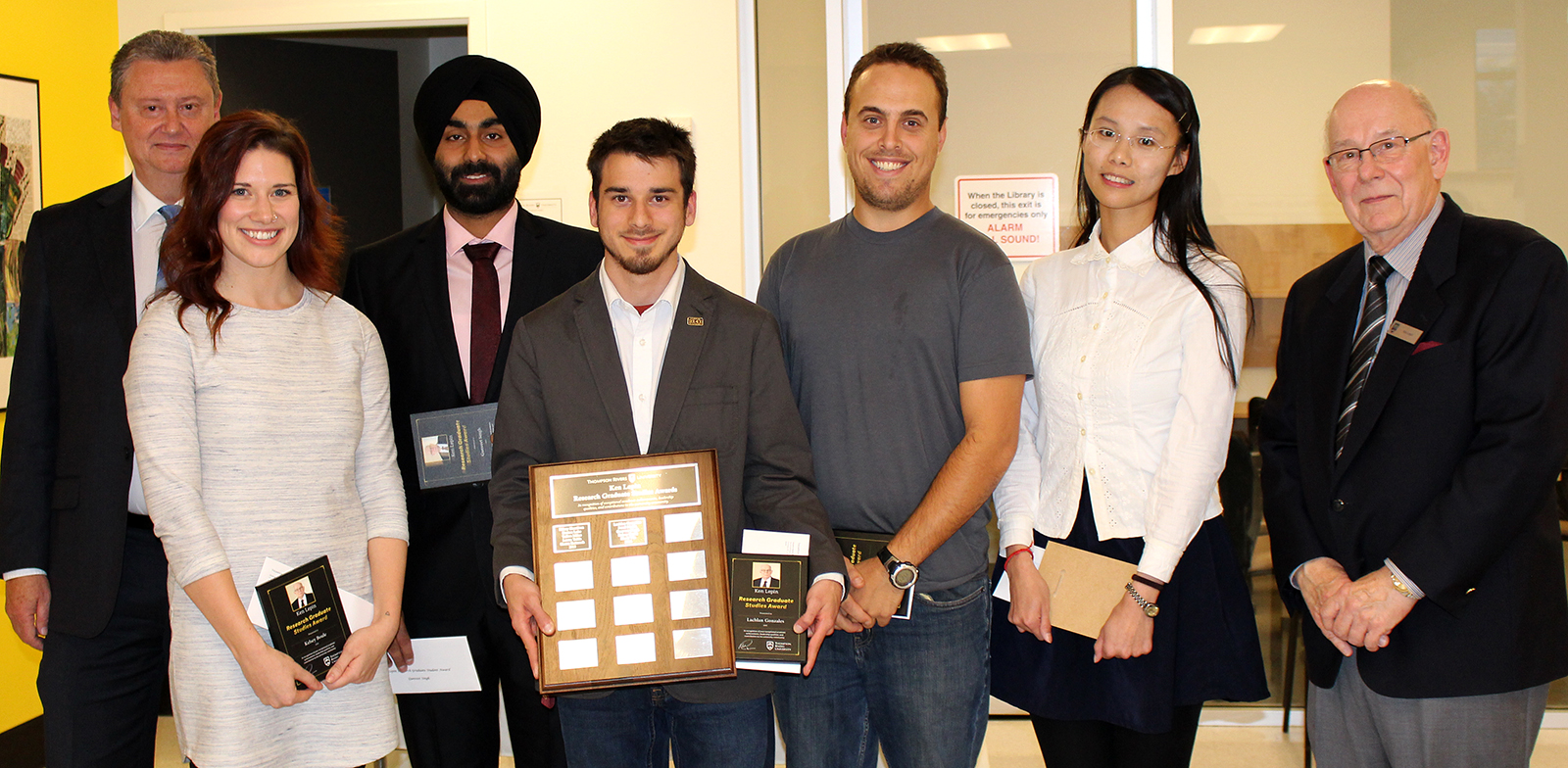 Dr. Will Garrett-Petts, AVP Research and Graduate Studies (left) and Ken Lepin (right), congratulate recipients of the 2016 Ken Lepin Graduate Student Awards, including (from second left) Kelsey Boule, Gunveet Singh, Lachlan Gonzales, Jared Maida and Ziwei Wu. 