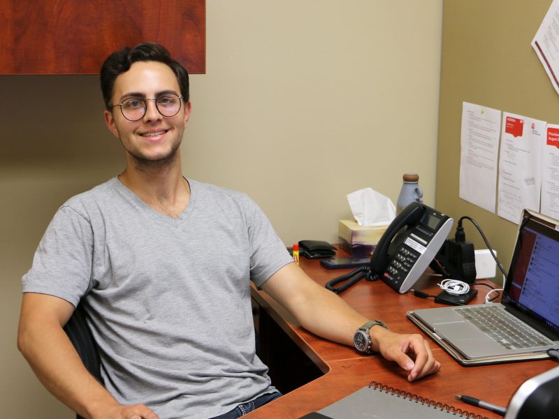 Nick Saxby at his desk in the United Way offices