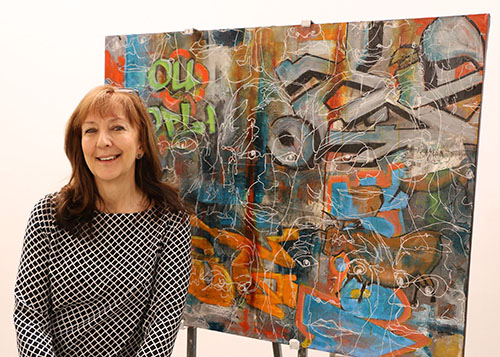 Carol Schlosar with one of her latest pieces