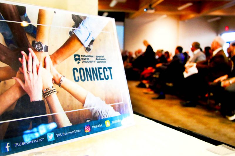 School of Business Connect poster on a table top
