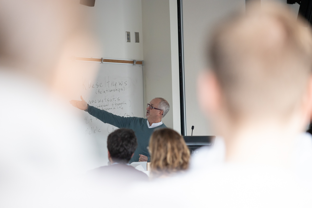A photograph of faculty member Jeff McLauglin presents at the 2019 PHP Conference.