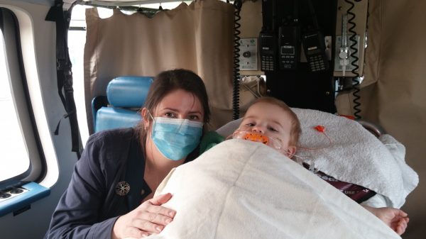 Christabel (left) and Imogen head home to Victoria via air ambulance after weeks in pediatric intensive care at Vancouver Children’s Hospital. 