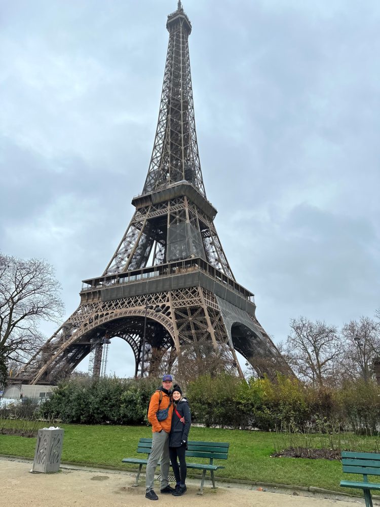 Couple in front of the Eiffel Tower