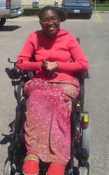 woman in a motorized wheelchair