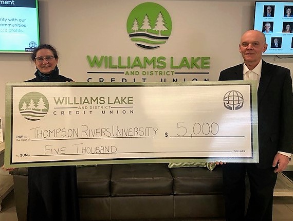 Williams Lake and Districted Credit Union presents a cheque for $5,000.