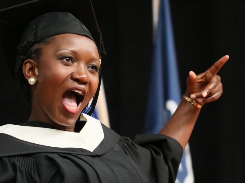 Convocation arts student cheer on stage