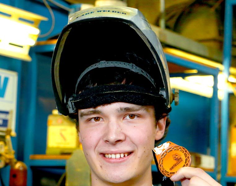 Andrew Christensen with WorldSkills medal of excellence