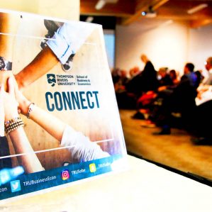 School of Business Connect poster on a table top