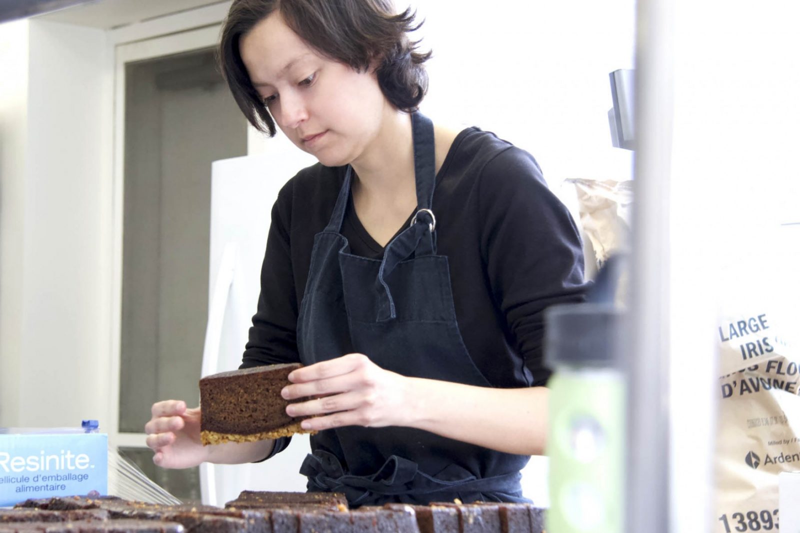 Daphne Peterson prepares dessert bread for sale during her ESTR practicum at Gold Leaf Pastries.