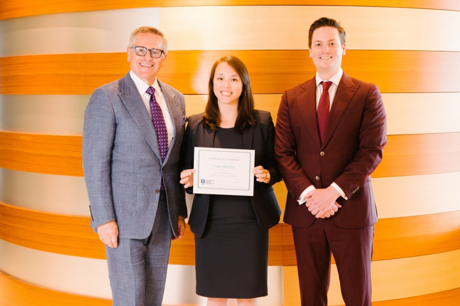 Donor presents scholarship to TRU Law student.