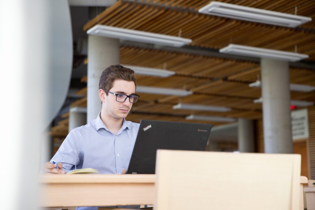 Student studying on laptop