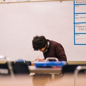 person studying alone in a classroom