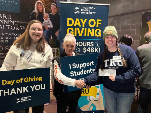 Kamloops Blazers Scholarship and Education Society (centre) with TRU respiratory therapy student Cassy Kather (left) and Victoria Hutton, BScN student (right). 