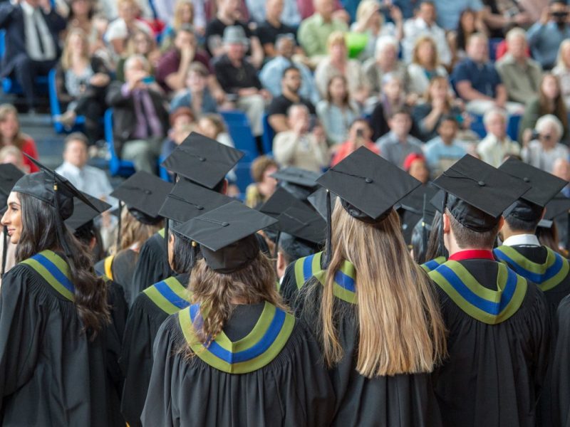 graduates in cap and gown