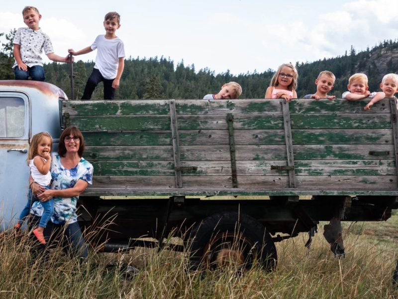 Jamie Collins, prior to his passing, with his wife, Linda, and grandchildren.