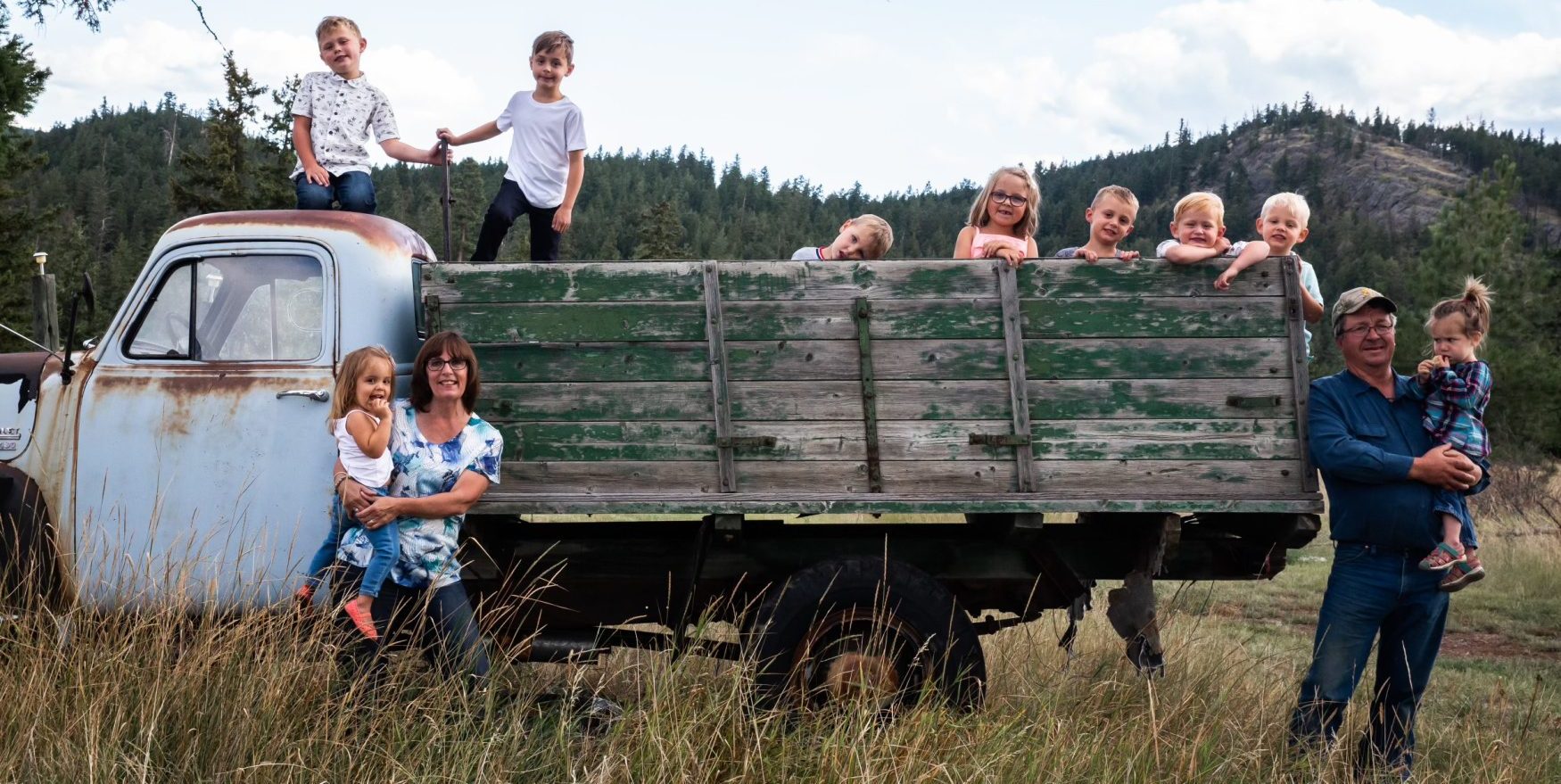 Jamie Collins, prior to his passing, with his wife, Linda, and grandchildren.