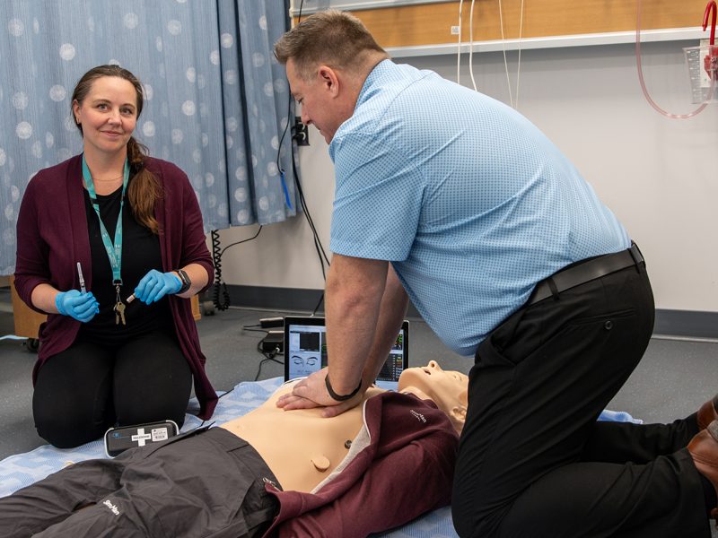 Nursing manikins simulate patients in CPR and naloxone training.