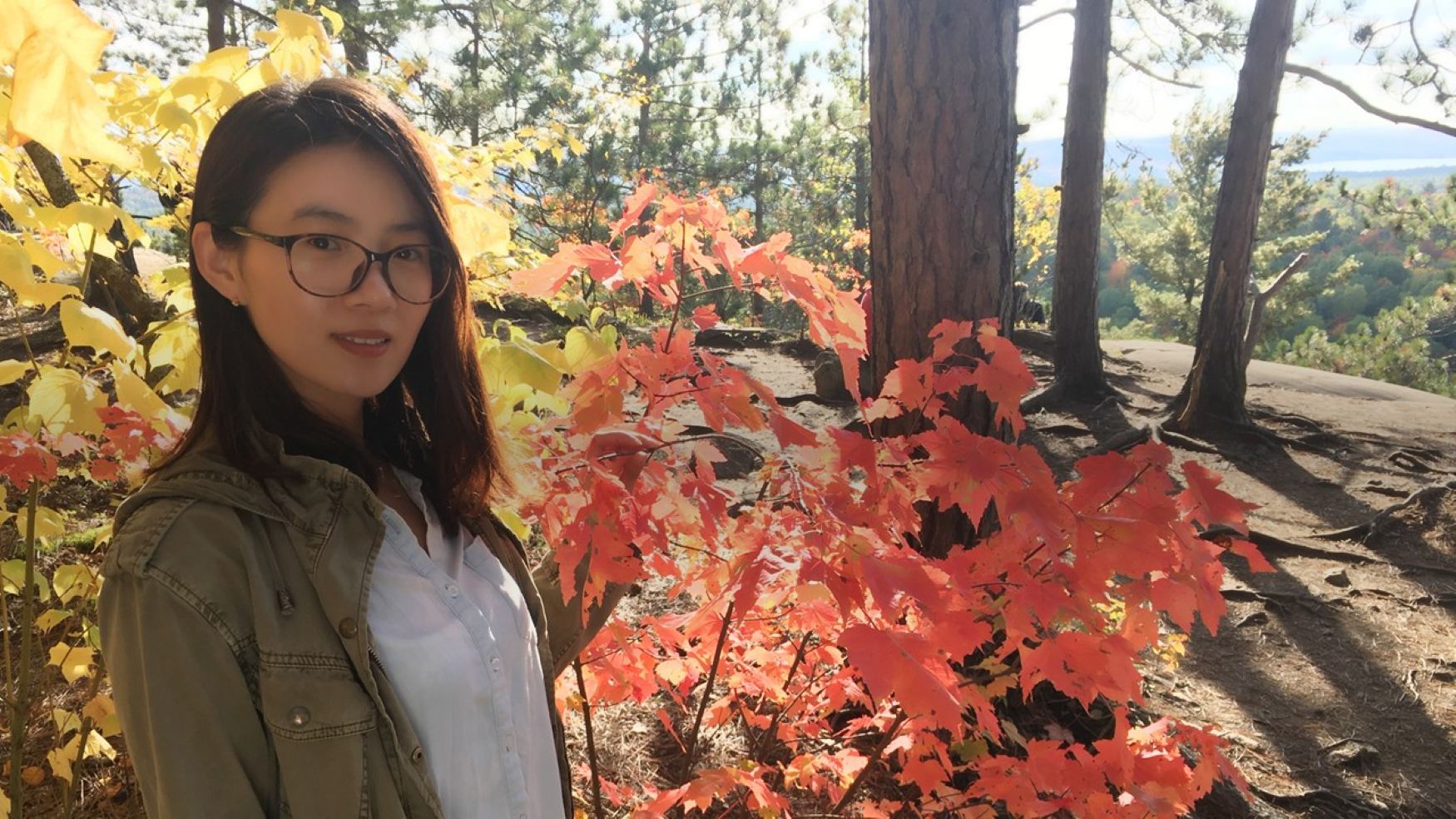Dr. Yue Zhang in a BC forest.