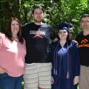 Alum Travis Standen (far right) with his wife Jennifer, son Spencer and daughter Marissa.